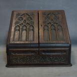 A Victorian oak Gothic style stationery cabinet, H.37 W.40 D.29cm