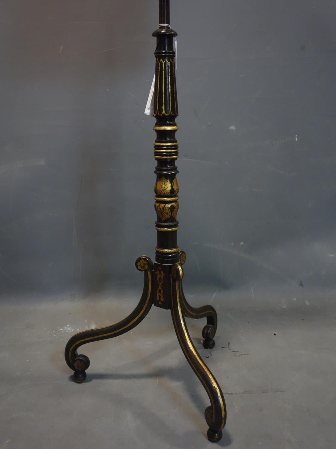 A late 19th/early 20th century ebonised and gilt painted adjustable fire guard, raised on 3 scroll - Image 3 of 3