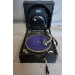 A Decca Model 66 portable record player with winding handle, H.21 W.30 D.39cm