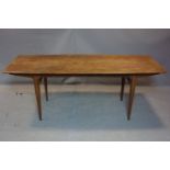 A 20th century Younger 'Fonseca' teak dining table, by John Herbert, raised on tapered legs, H.75