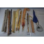 A collection of 10 vintage fishing rods to include 2 split cane and 8 bamboo, together with an