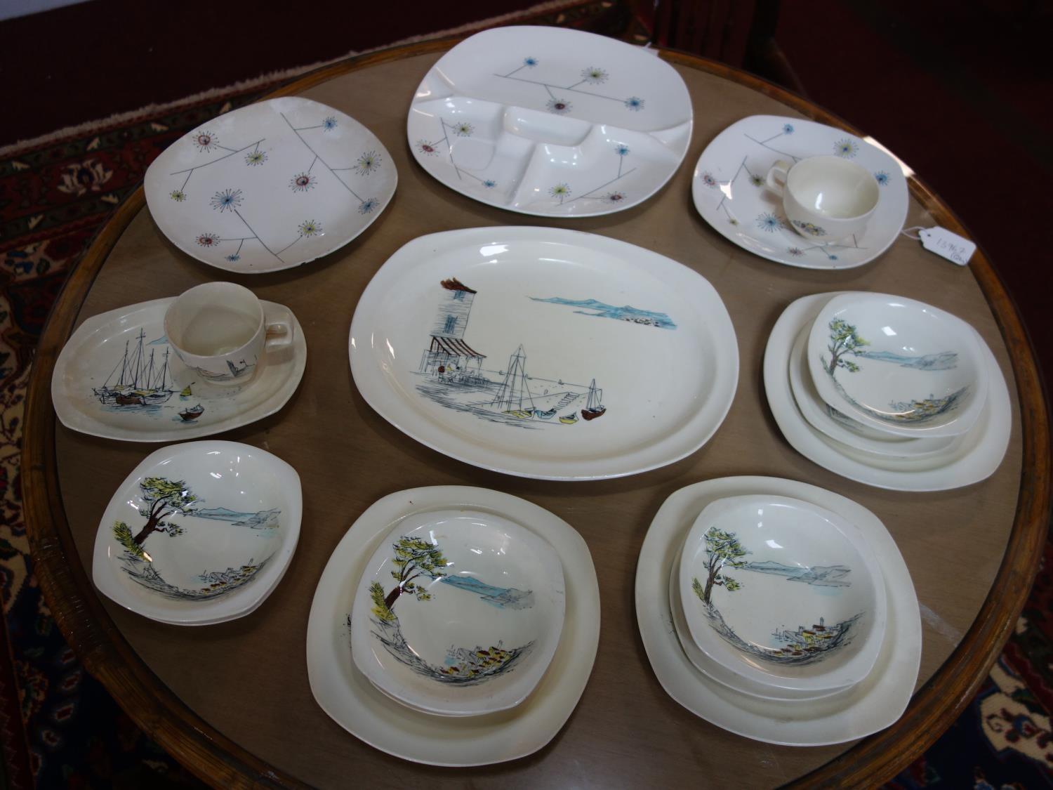 A collection of Midwinter tableware, to include Riviera plates, teacups, saucers, platter, and