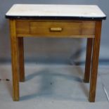 A pine table with enamel top above short drawer, on square reeded legs, H.77 W.76 D.46cm