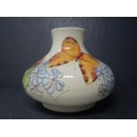 A large Moorcroft squat vase, decorated with butterflies, with initials and dated '93 to base, H.