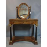 A 19th century Biedermeier satin wood dressing table, with oval swing mirror above marble top and