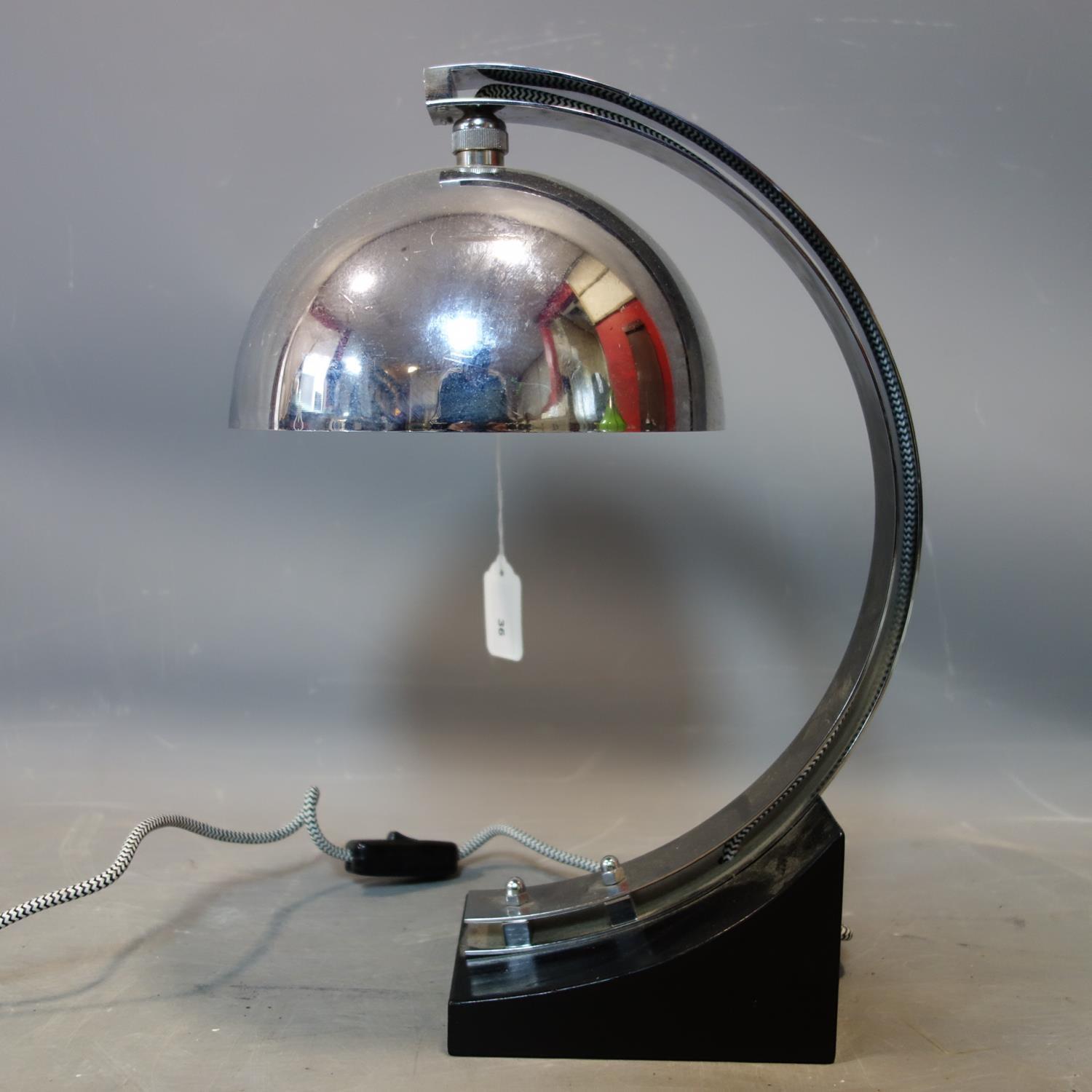 A vintage chrome arch table lamp, on ebonized base, H.41cm