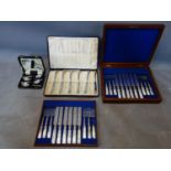 A cased set of six silver teaspoons by Atkin Brothers, Sheffield 1931; six Asprey silver dessert