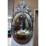 A 20th century oval Venetian mirror, 123 x 65cm