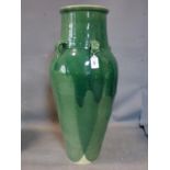 A Persian green glazed Sharab wine vessel, H.77cm