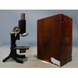 A cased vintage microscope, numbered 12021 W to base, H.28cm