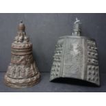Two antique Bronze Bells to include a Chinese example and one decorated with religious scenes