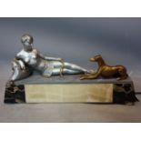 A French Art Deco figural lamp on marble base, H.22 W.43 D.11cm