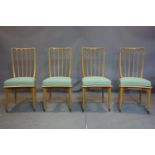 A set of 4 Paulo Buffa style Italian dining chairs