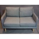 A contemporary John Lewis two seater sofa with grey upholstery, H.77 W.132 D.78cm