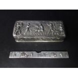 A Victorian silver box, repousse decorated with a Classical scene of satyrs and figures and