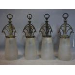 A set of four Art Nouveau ceiling lights with stylised supports and frosted glass shades, H.40cm (4)