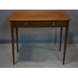 A 19th century oak and mahogany side table, having long drawer above square tapered legs, H.72 W.