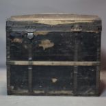 An early 20th century domed top trunk, H.62 W.71 D.45cm, hinges broken