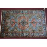 A North west Persian Tafresh rug, the triple pole medallion, on an elephant field, contained by