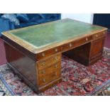 A 19th century mahogany partners desk, the green leather skiver with gilt Greek key border, with