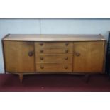 A vintage teak sideboard by A.Younger, raised on tapered legs, H.83 W.169 D.49cm