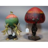 A vintage red glass and wrought iron mushroom lamp, signed, together with a gilt metal dragonfly