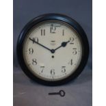 A 20th century Smith eight day dial clock, having 11.5 inch dial Arabic dial, total diameter 40cm