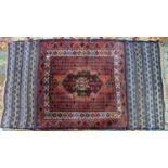 A 20th century Afghan Belouch rug, with geometric motifs, on a Blue ground, 154 x 80cm