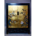 WITHDRAWN- A Chinese cabinet with bird and flower decoration, having two cupboard doors above