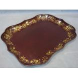 An early 19th century lacquer papier-mache tray by Clay of King Street, Covent Garden, having gilt