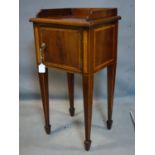 A 19th century mahogany and satinwood inlaid bedside cupboard, stamped T.Wilson, H.81 W.41 D.36cm