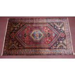 A Northwest Persian Zanjan rug, central diamond medallion with repeating geometric motifs on a
