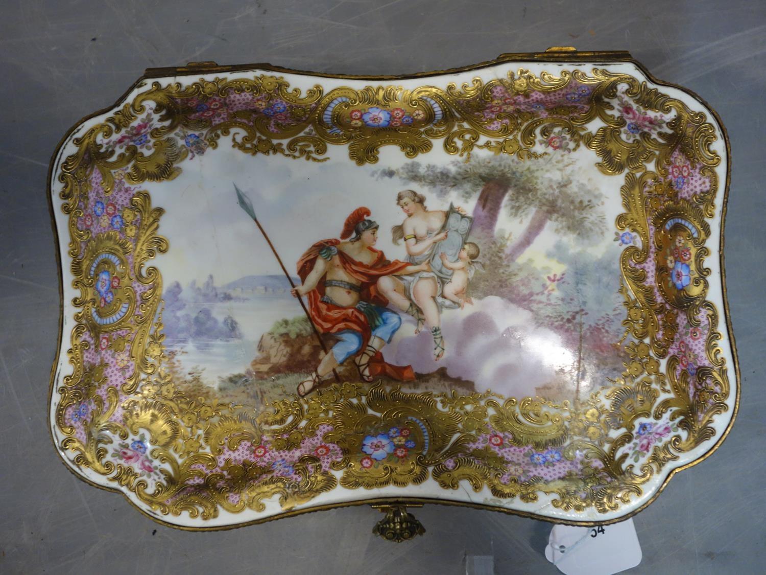 A late 19th/early 20th century hand painted porcelain casket, lid restored, H.10 W.32 D.22cm - Image 3 of 5