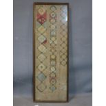 An early 19th century sampler, possibly cut down, framed, 86 x 29cm