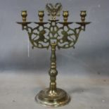 A late 19th/early 20th century Russian brass candelabra, with double headed eagle finial, H.50cm