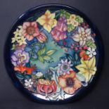 A Moorcroft limited edition charger by Rachel Bishop, 'Carousel' pattern, signed and dated 1997 to