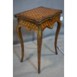 A 19th century French parquetry and kingwood card table, with ormolu mounts, raised on cabriole
