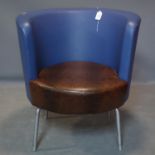A vintage vinyl upholstered armchair