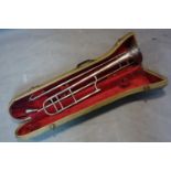 A Victorian trombone, in need of repair, in case, L.71cm