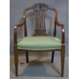 A late 19th century Hepplewhite style mahogany carver chair