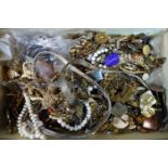 A large and assorted collection of costume jewellery, to include necklaces, rings, brooches, bangles