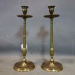 A pair of brass turned column candlesticks. H.40cm