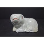 A Chinese glazed ceramic dog, H.9 W.14 D.10cm