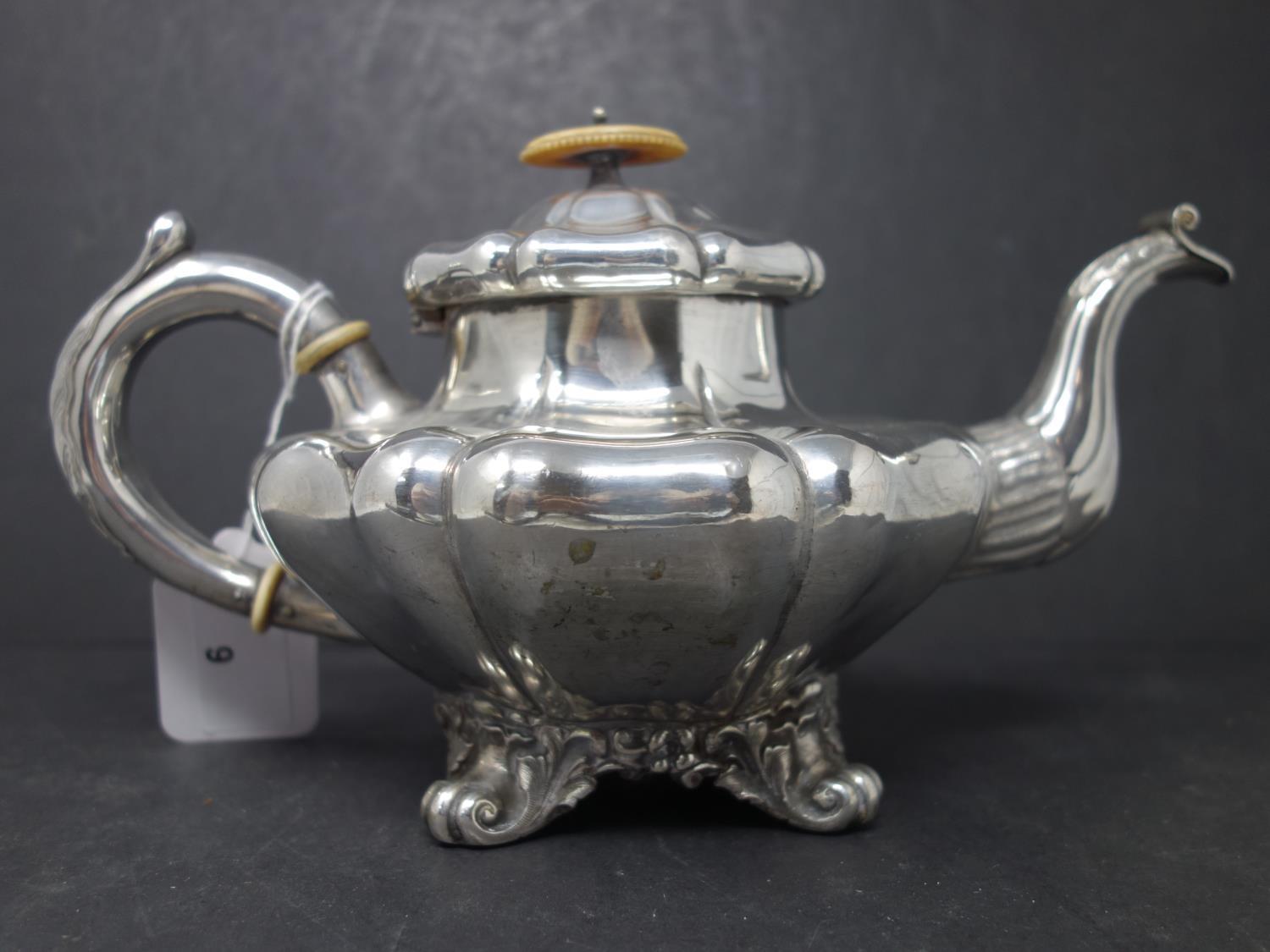 A 19th century continental silver tea pot stamped 'Niemeyer', with ivory finial, 17oz