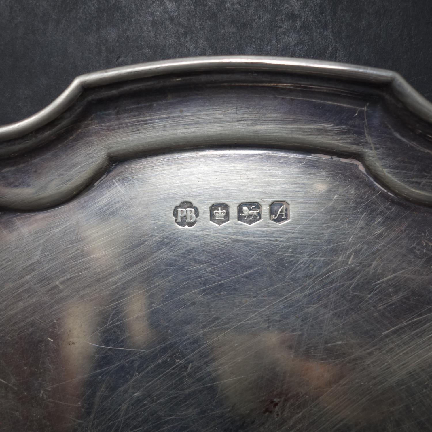 A 20th century silver card tray, with initials P.B, dated 1975, 8oz - Image 2 of 2