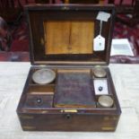 A 19th century campaign rosewood writing box, brass bound, H.13 W.28 D.20cm
