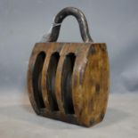 An antique pulley, H.30cm