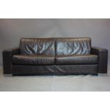 An Italian Milano leather sofa bed. 222cm L x 92cm H x 92cm W