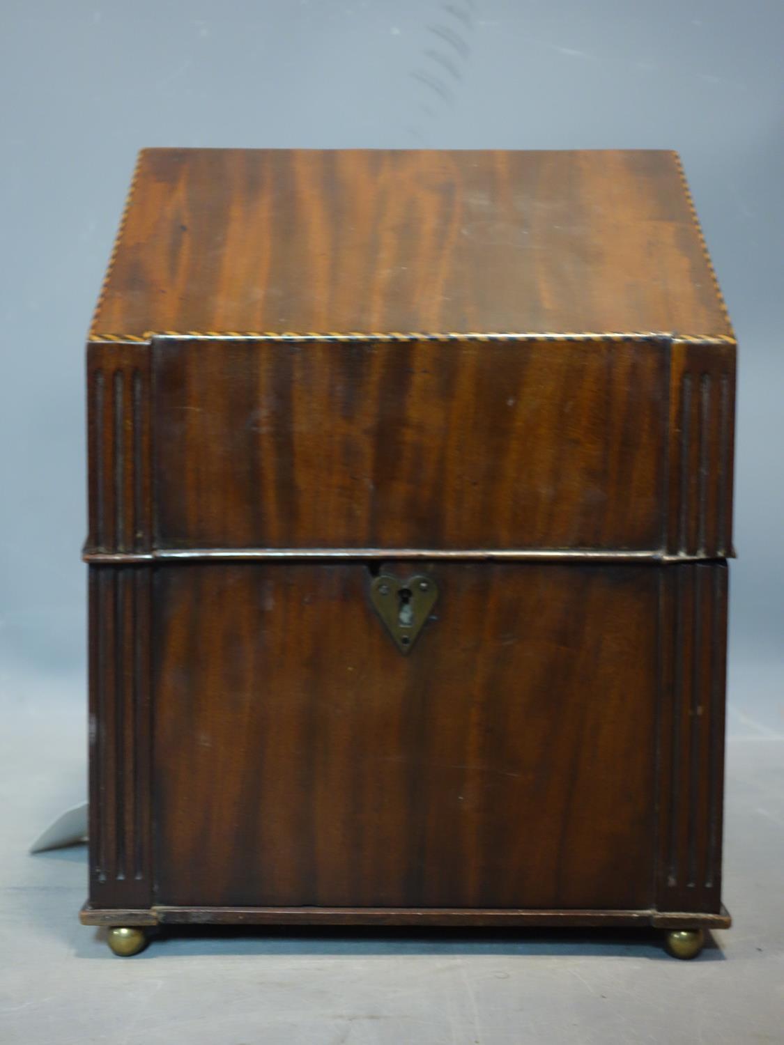 A Georgian inlaid mahogany stationery box, raised on brass ball feet, in the form of a writing - Image 2 of 3