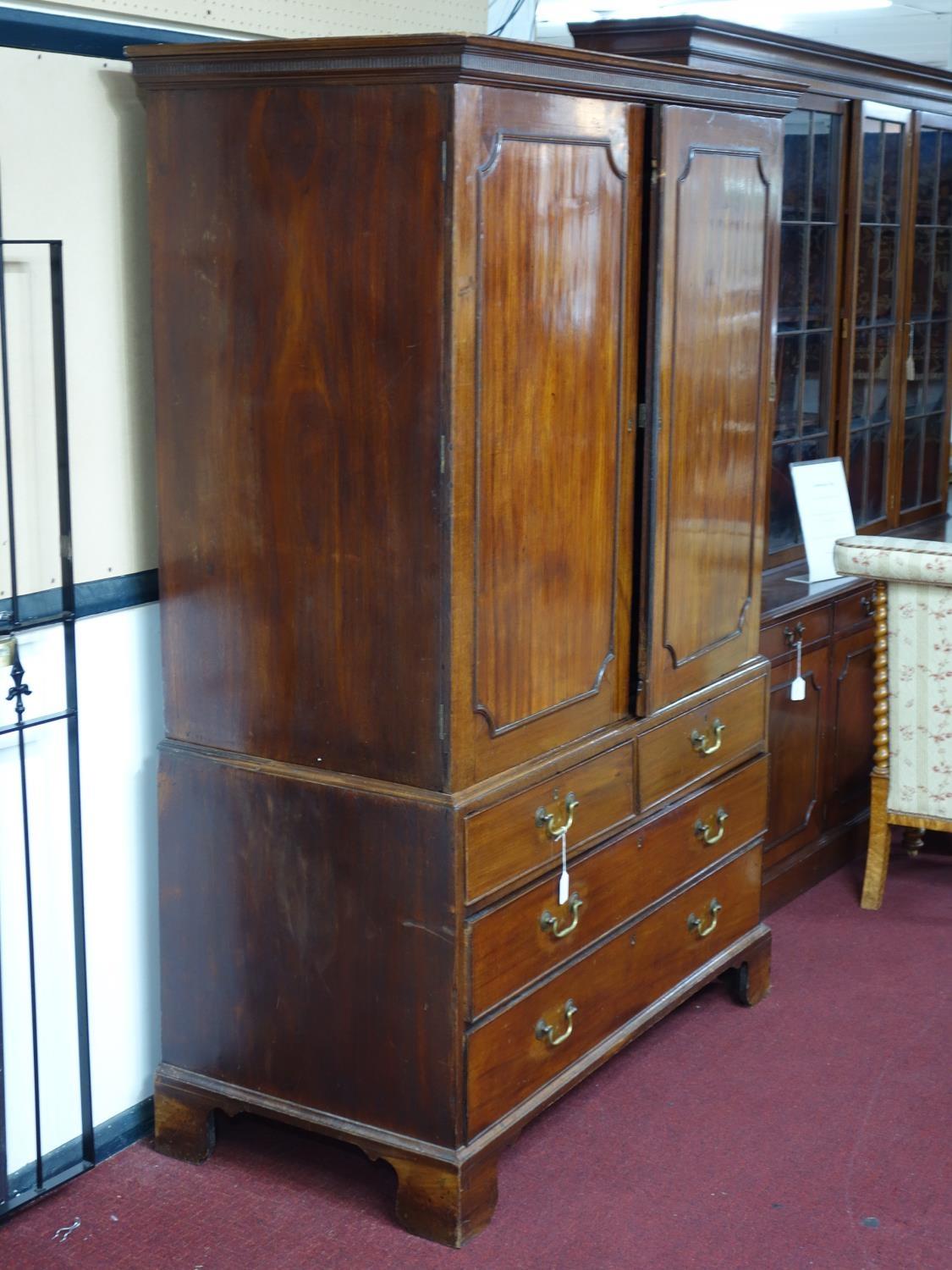 A late 18th century mahogany linen press, with 2 doors enclosing linen trays, above drawers, - Image 3 of 3